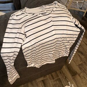 V-neck black and white striped shirt